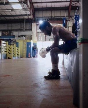 Boxing videography: boxer resting between rounds in a Merseyside gym